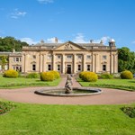 Front exterior of Wortley Hall stately home, showcasing its historic architecture and landscaped grounds.