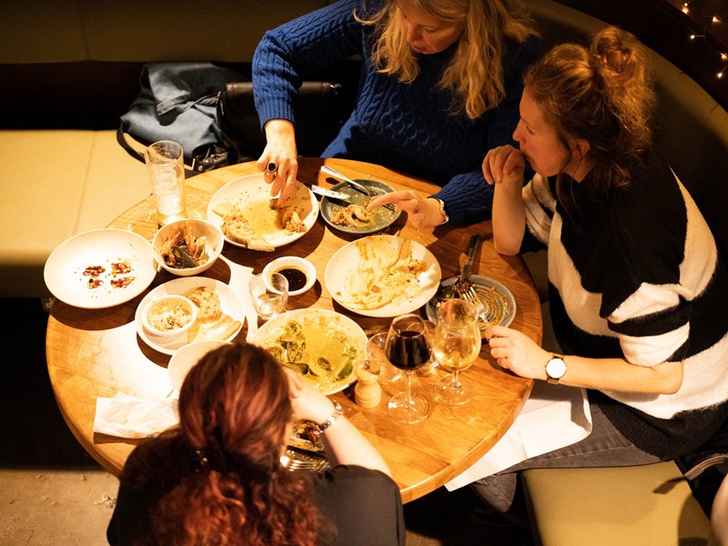 Three people dining at Cornerstone.
