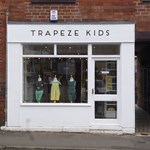 An exterior shot of the shop Trapeze Kids.