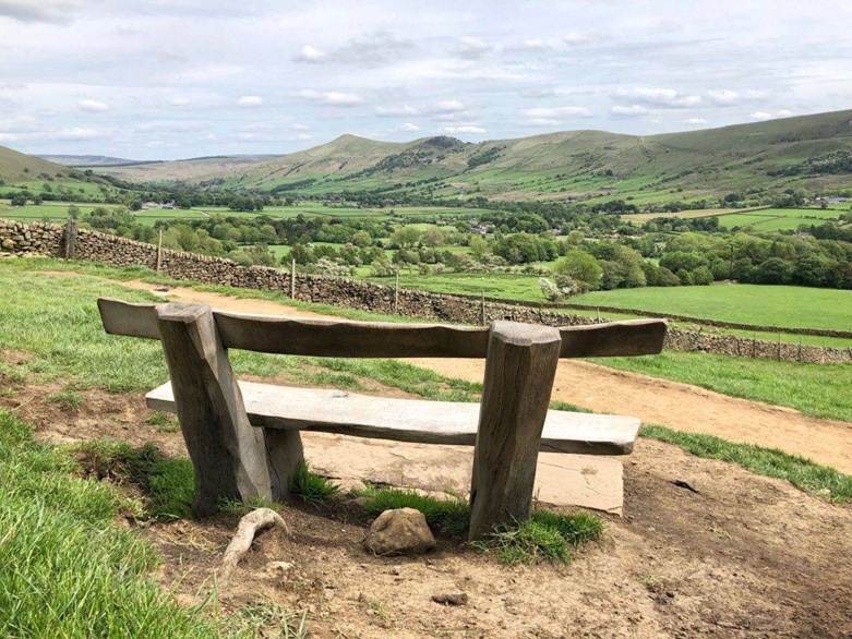 Bench view of the Peak District from The Great Ridge,