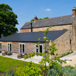 An exterior photo of the back of Manor Oaks House.