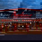 The exterior of Napoleons Casino & Restaurant at night.