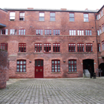 The red brick exterior of Butcher Works.