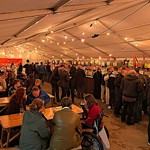 A tent filled with people at the Steel City Beer And Cider Festival.