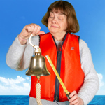 A person, wearing a life jackets, holds a ships bell and a tape measure.