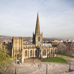An aerial view of Sheffield Cathedral on a bright sunny day.