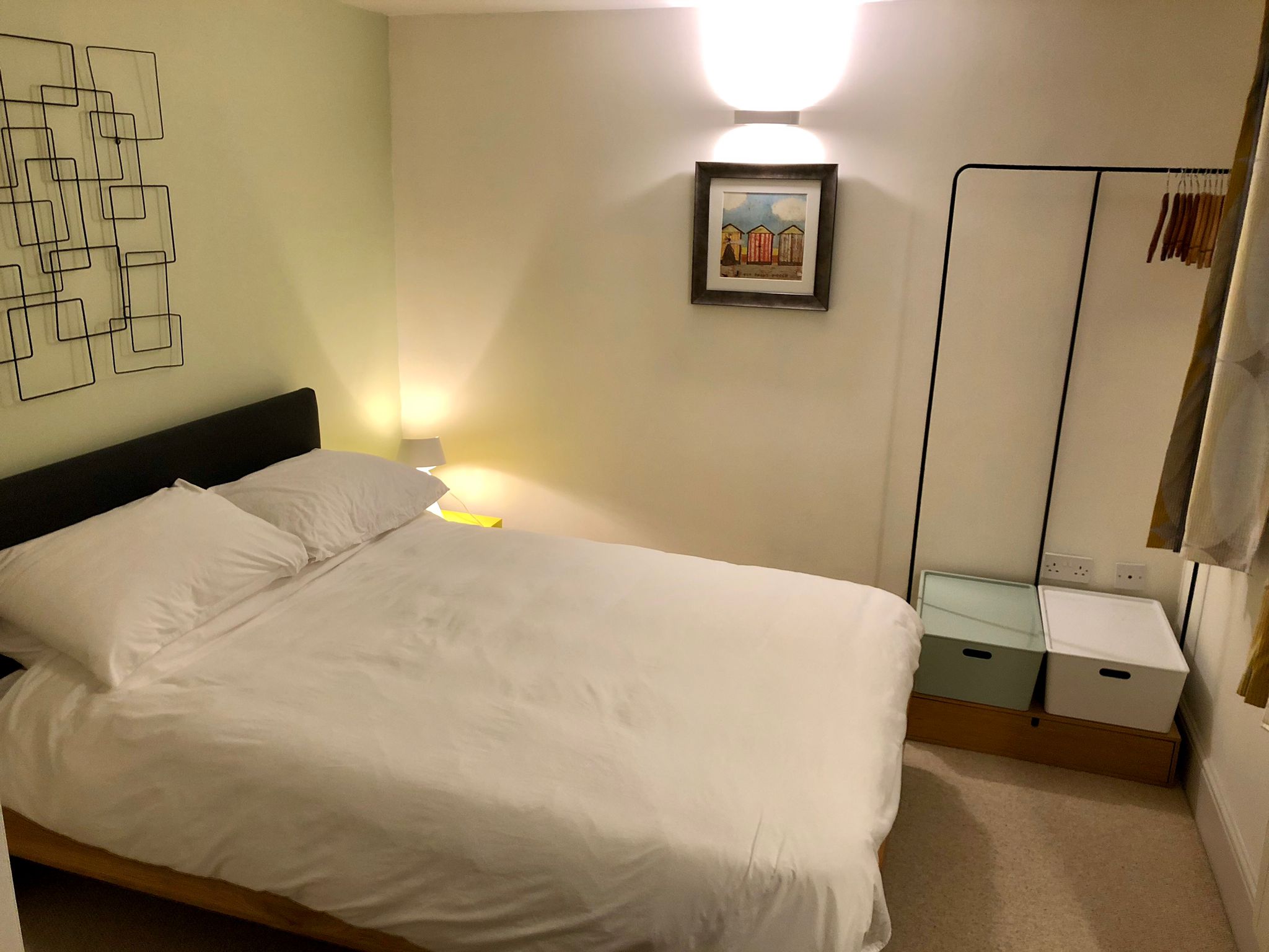 Bright and tidy small double bedroom in Homely Apartments – Figtree with modern décor