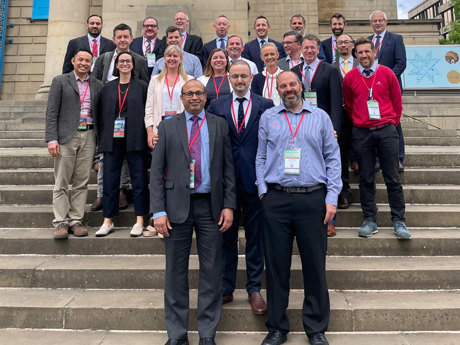 A portrait of all the speakers at the Kids Knee Conference, on the steps of the Sheffield City Hall.