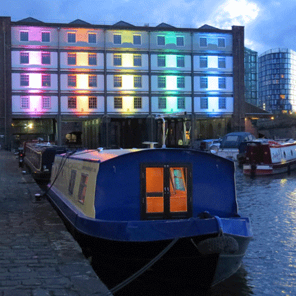 View of Victoria Quays with the Houseboat Hotel visible along the waterfront.