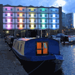View of Victoria Quays with the Houseboat Hotel visible along the waterfront.