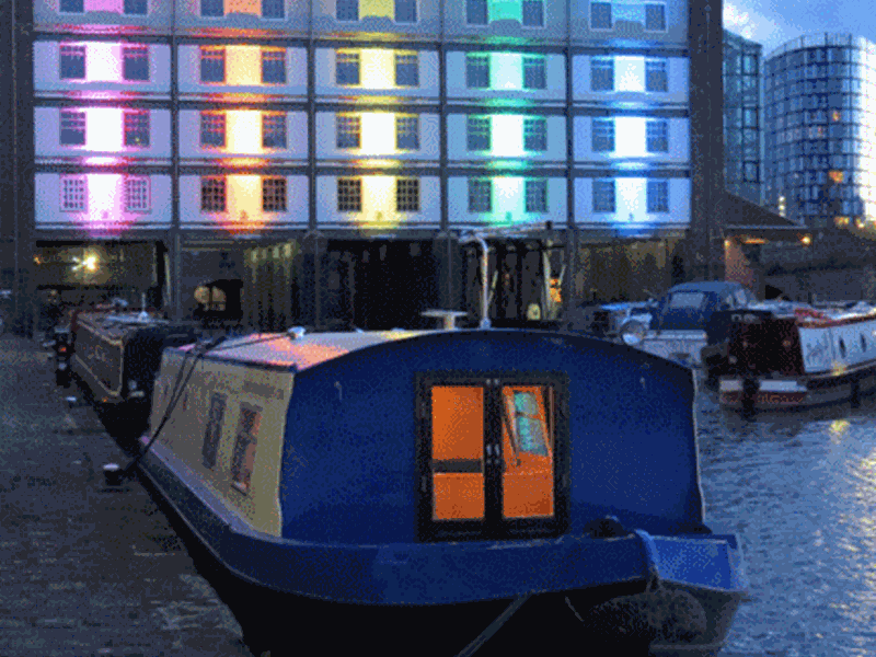 View of Victoria Quays with the Houseboat Hotel visible along the waterfront.