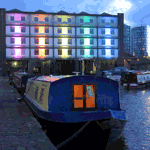 View of Victoria Quays with the Houseboat Hotel visible along the waterfront.