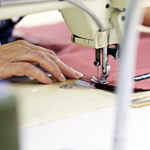 A Buffalo Systems jacket being sewn together.