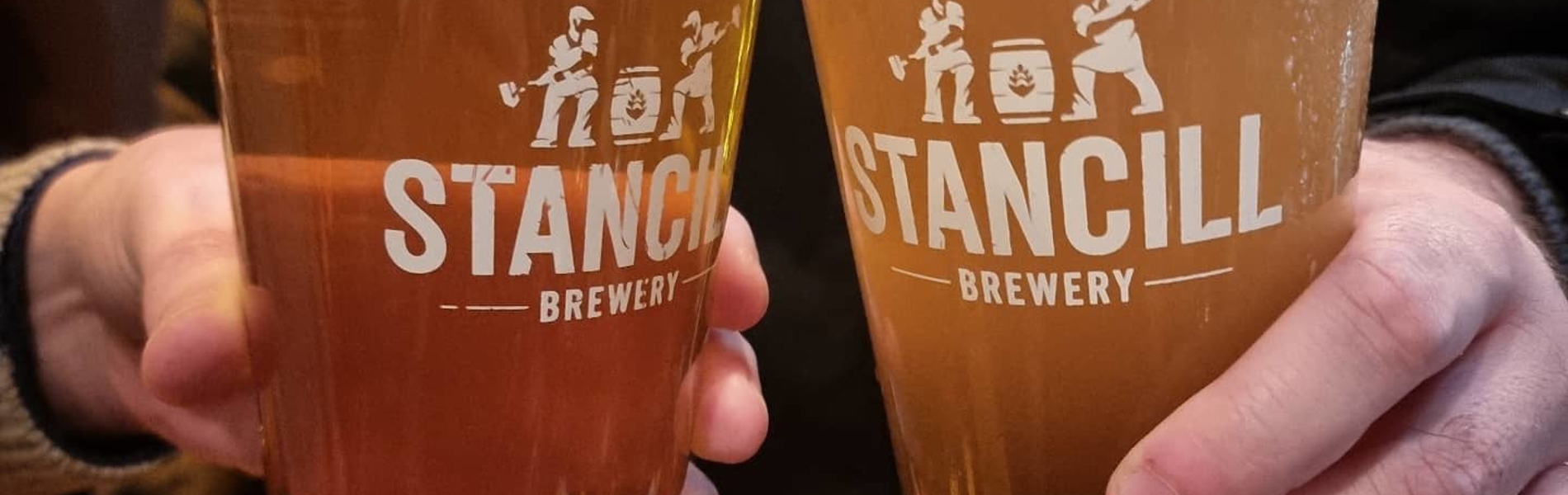 A close up of two pints of beer in Stancill Brewery glasses.