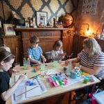 Children enjoying craft activities at The Steel Cauldron.