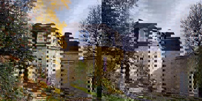 The exterior of the Merlin Theatre.