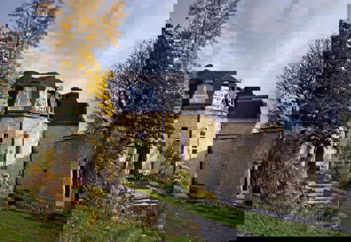 The exterior of the Merlin Theatre.