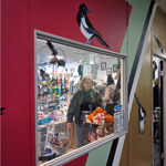 A view through a window into the interior of 7th Magpie, a little shop filled with lots of curious treasures from local makers, artists and designers.