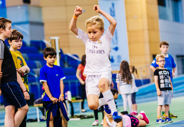 Young people taking part in Atheletics events at the  English Institute Of Sport.