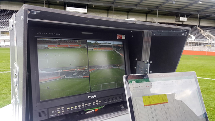 Offside VAR Technology set up next to a football pitch.