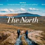 Promo image for the event featuring two people trekking along a path in the wilderness.