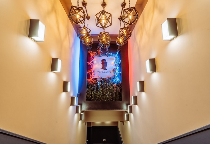 A corridor decorated in 1920s decor.