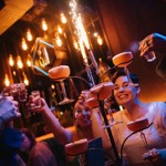 People enjoying cocktails at Manahatta.