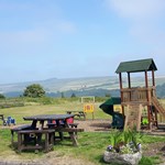 Beer garden and children's play area at the Three Merry Lads.