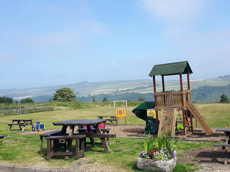 Beer garden and children's play area at the Three Merry Lads.