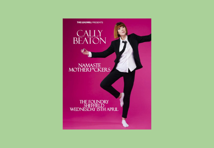 Poster for Cally Beaton: Namaste Motherf*ckers at the Foundry featuring a picture of Cally Beaton in a black suite and tie with a white shirt, standing on one leg in her socked feet.