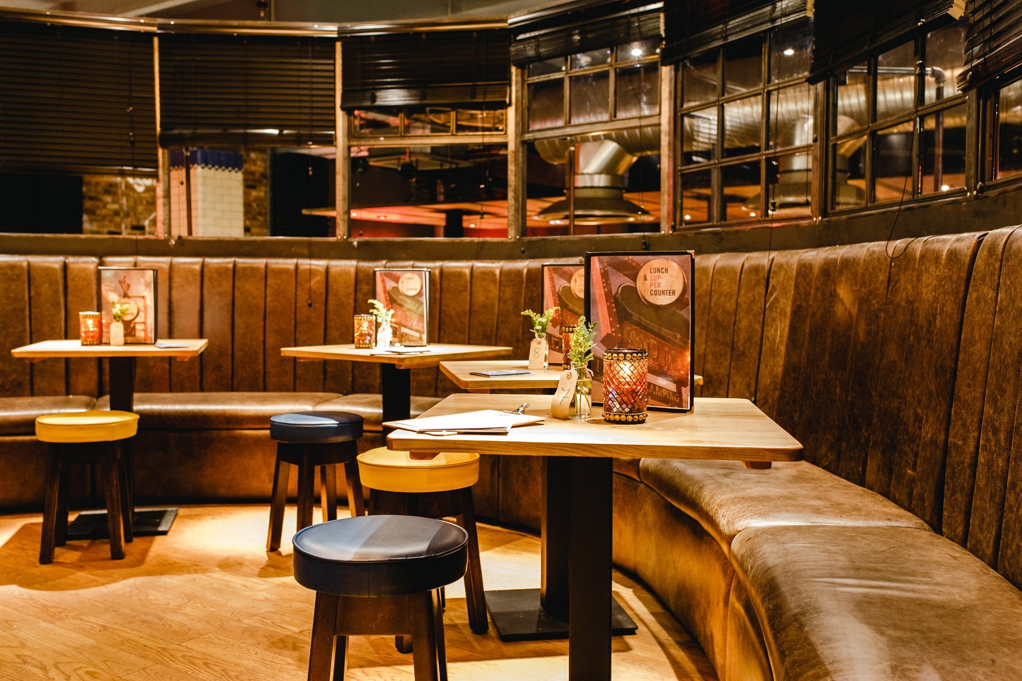 A curved row of tables at Bungalows & Bears.