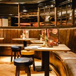A curved row of tables at Bungalows & Bears.