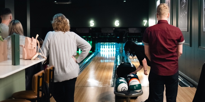 People bowling at Clubhouse.