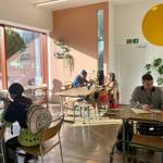 The bright, sunny interior of Kollective Kitchen.