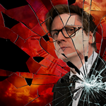 A picture of the comedian Ed Byrne, looking pensive, reflected in a smashed mirror.