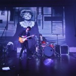 A band playing on a stage