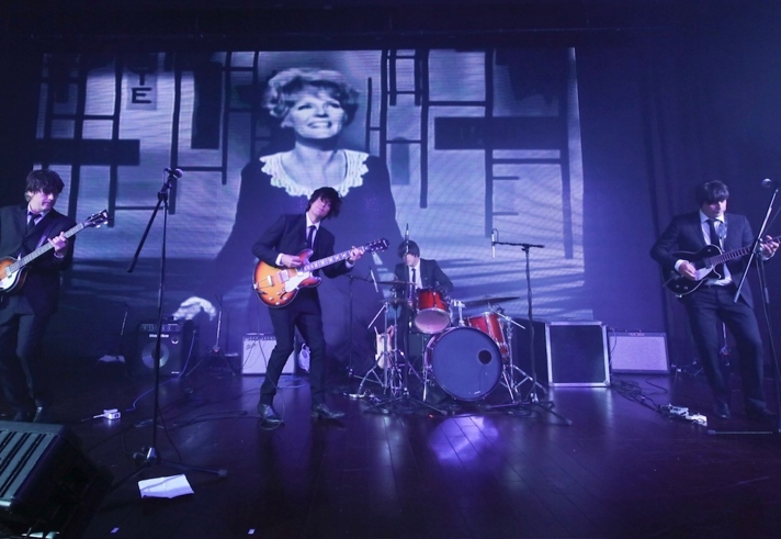 A band playing on a stage