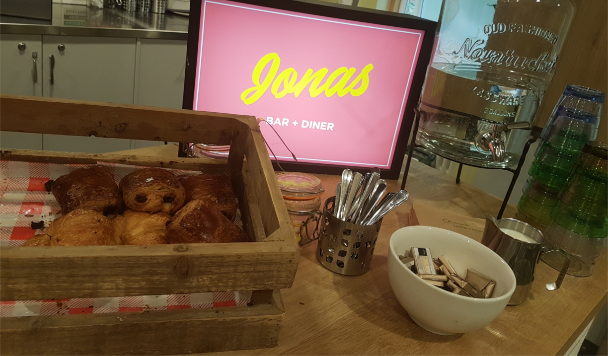 Jonas Court – crate containing a Danish TV screen and breakfast items.