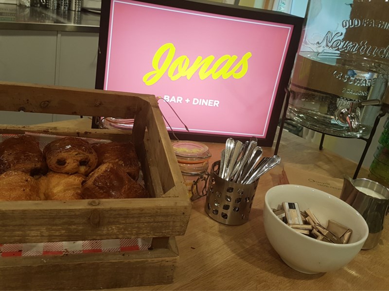 Jonas Court – crate containing a Danish TV screen and breakfast items.