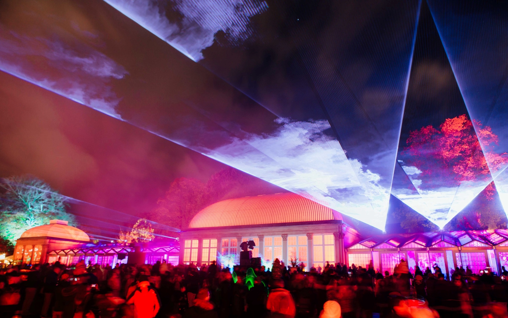 The Glass House and the Sheffield Botanical Gardens are lit up by a huge display of colourful lights.