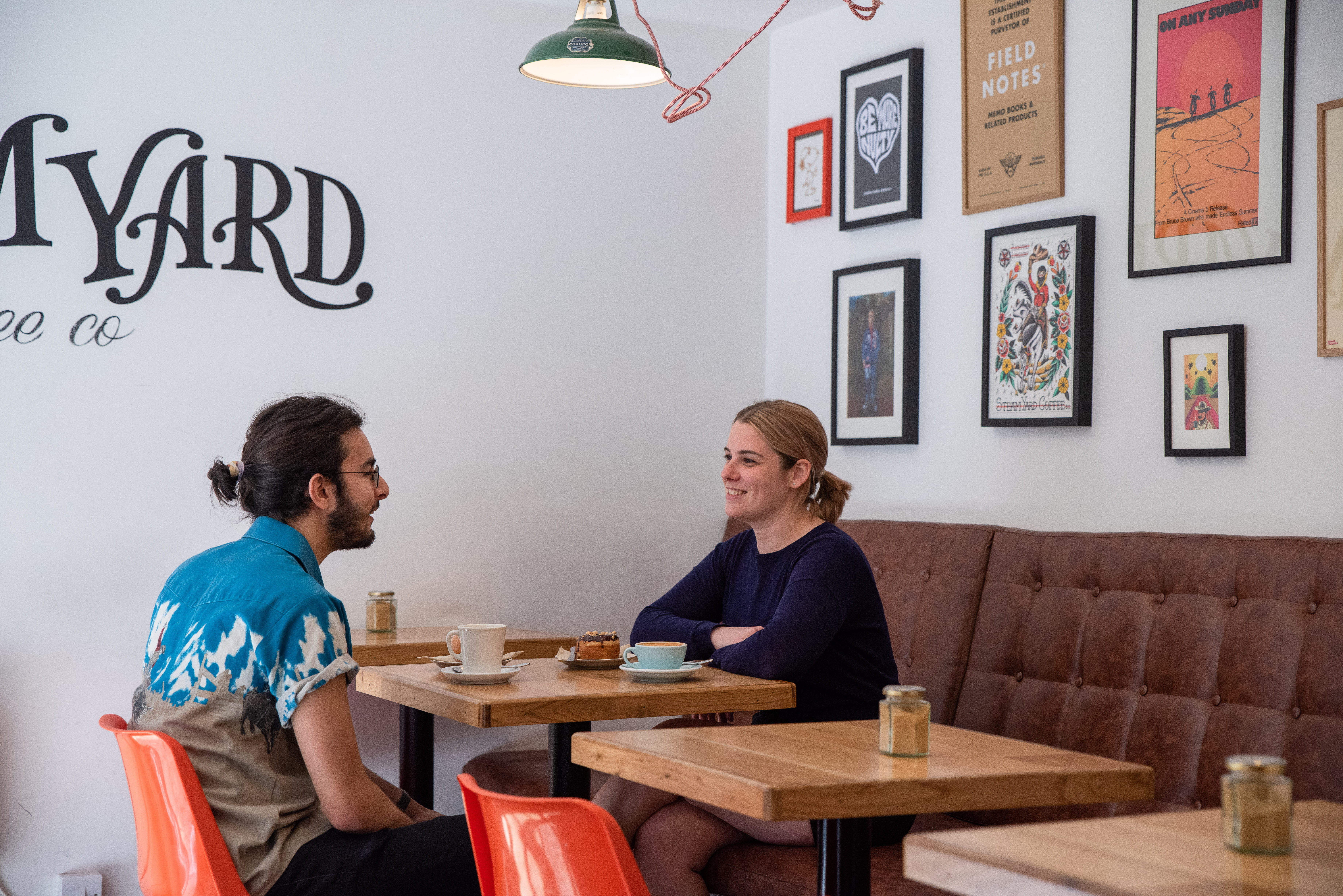 A couple having a coffee at Steam Yard.