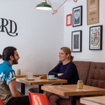 A couple having a coffee at Steam Yard.