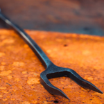 A wrought iron tool.