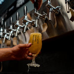 A beer being pulled at the Triple Point Brewery & Bar.