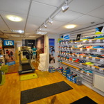 Wall displays full of running shoes at myRaceKit North.