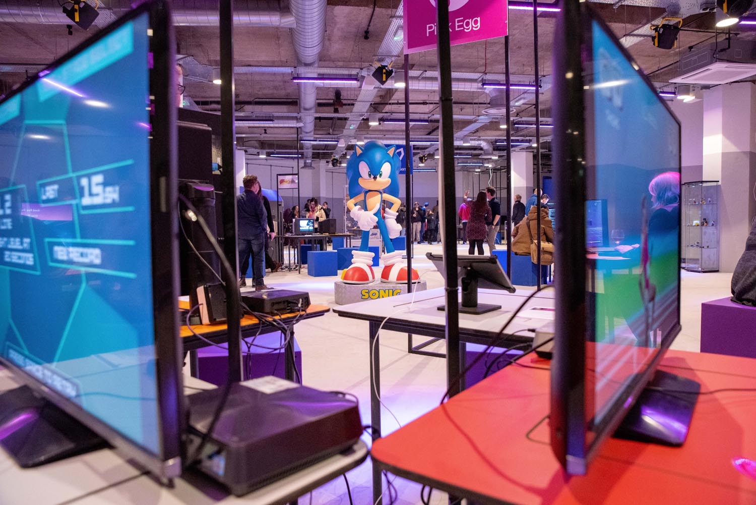 An interior shot of the National Video Games museum. There are lots of displays with retro video games consoles hooked up to screens.