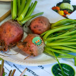 Root vegetables on display at a horticultural show.