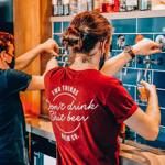 Two members of staff pulling pints at the Two Thirds Beer Co.
