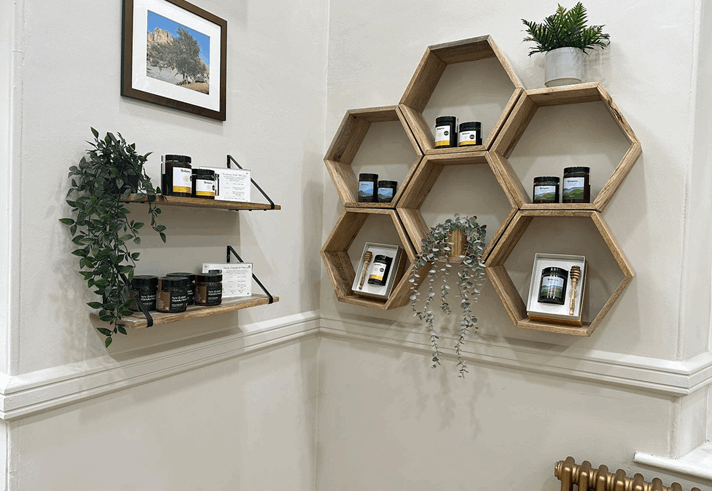 The interior of the Balqees shop, with lots of displays of honey.