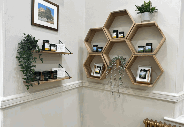 The interior of the Balqees shop, with lots of displays of honey.